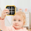 a child holding a game