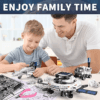 a man and boy playing with toys