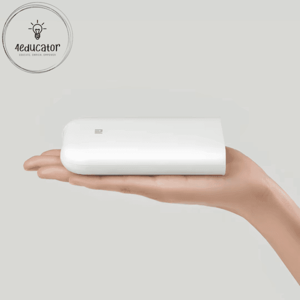 a hand holding a white rectangular object