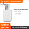 a white device with a picture of a city