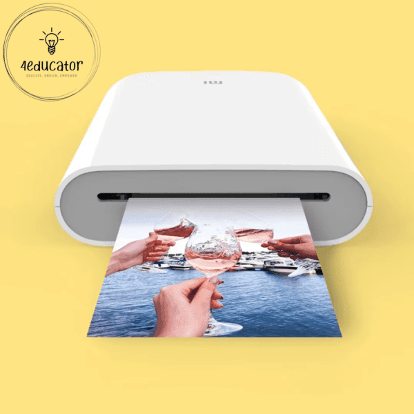 a white printer with hands holding a picture
